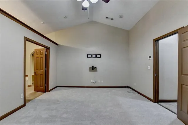 a kitchen with stainless steel appliances a refrigerator and a stove top oven