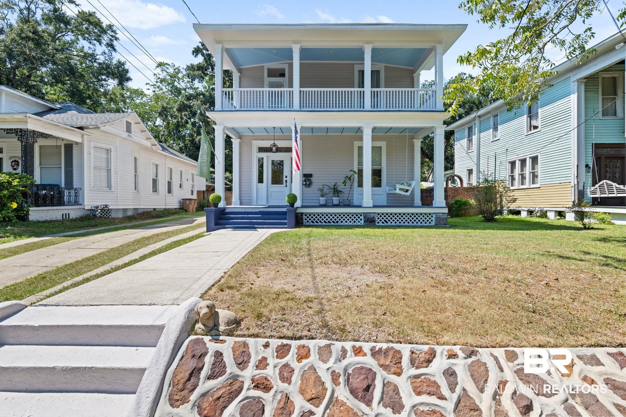 10 South Monterey Street Mobile, AL 36604 - Photo 4 of 45 View of front of property featuring a porch and a front lawn