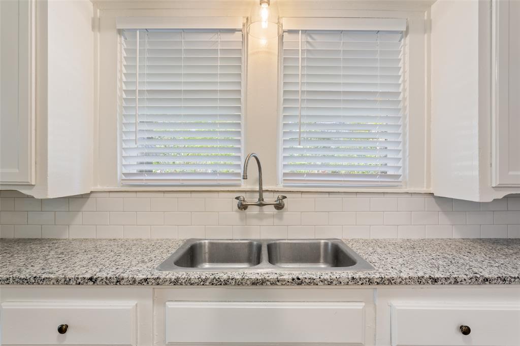 1624 North 17th Street Waco, TX 76707 - Photo 15 of 34 a kitchen with a sink and a window