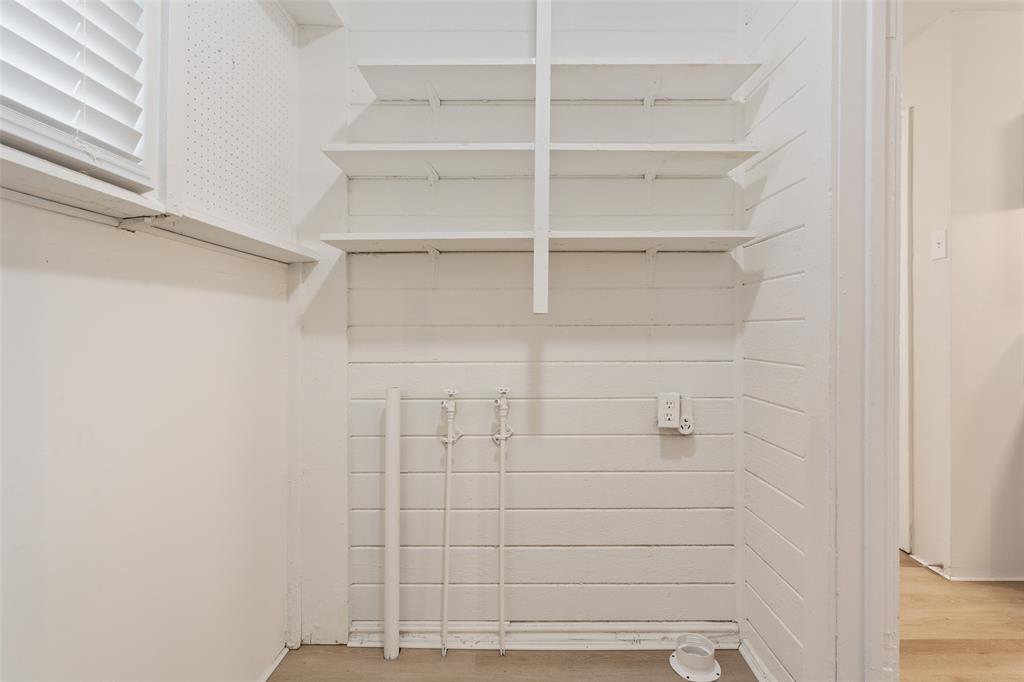 1624 North 17th Street Waco, TX 76707 - Photo 18 of 34 a view of a store room with shelf