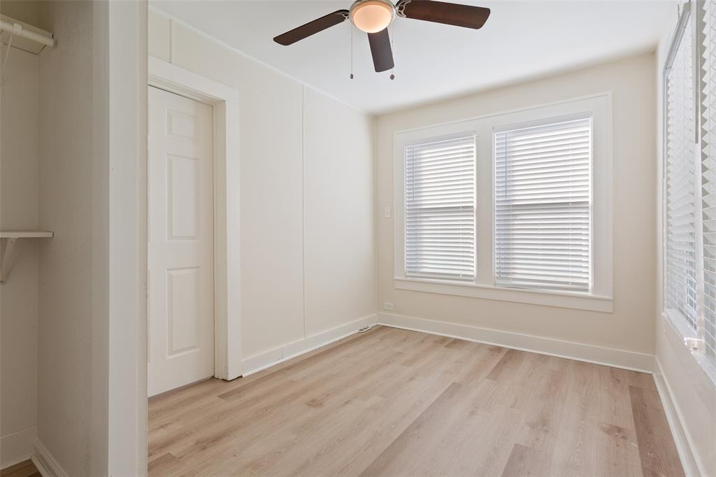 1624 North 17th Street Waco, TX 76707 - Photo 21 of 34 a view of an empty room with wooden floor and a window