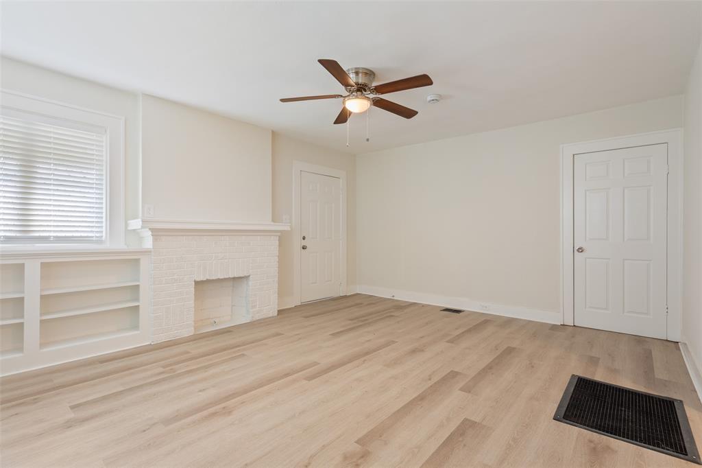 1624 North 17th Street Waco, TX 76707 - Photo 5 of 34 a view of empty room with wooden floor and fan