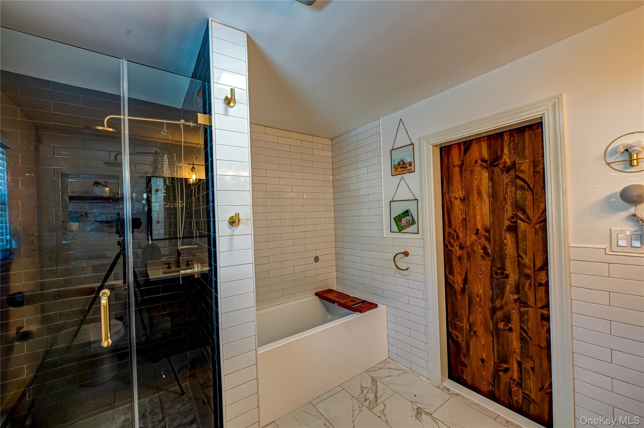 1 Freedom Court Babylon, NY 11702 - Photo 17 of 23 a bathroom with a shower and a tub