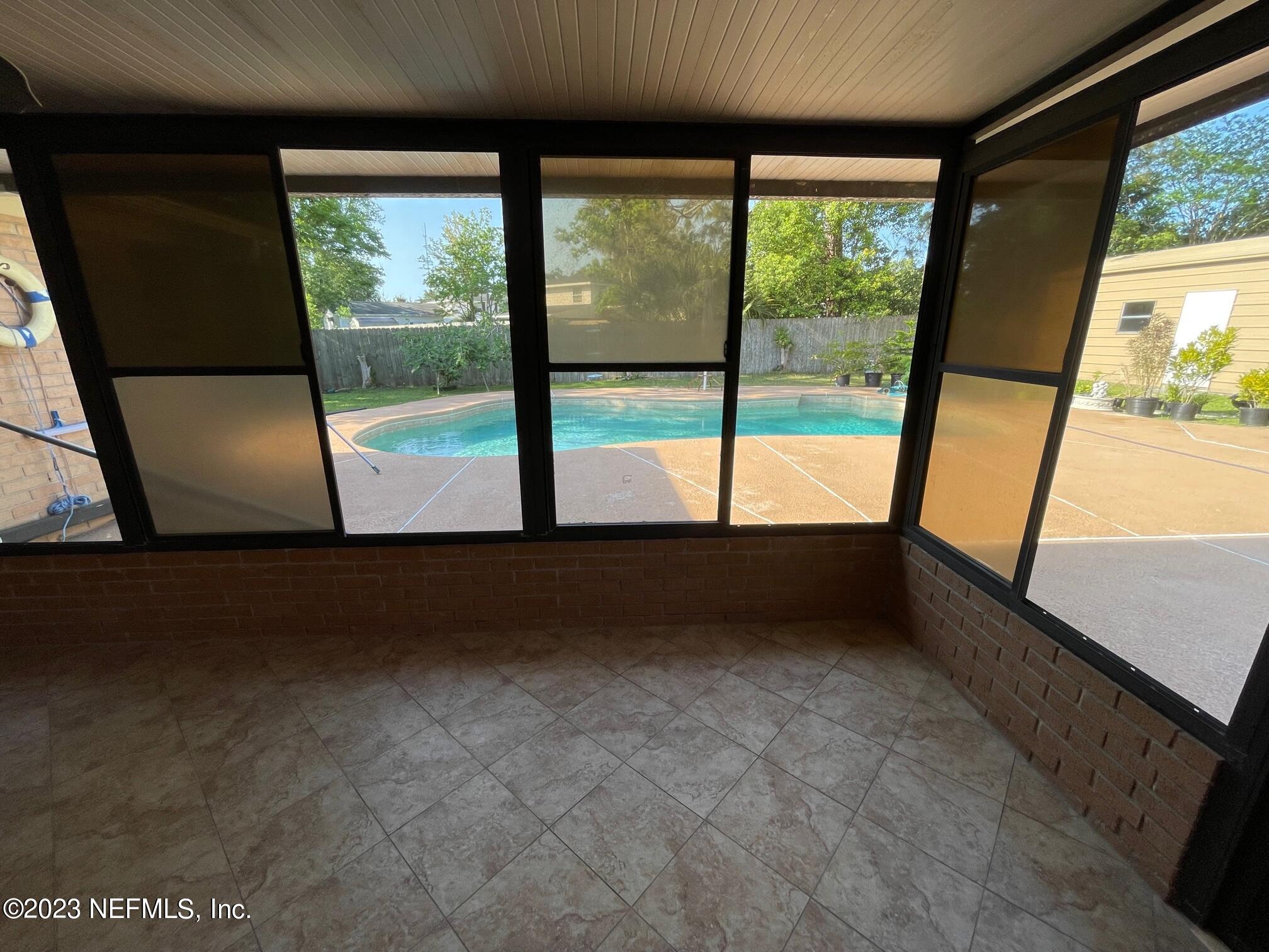 1042 Jamaica Road East Jacksonville, FL 32216 - Photo 11 of 59 a view of room with window