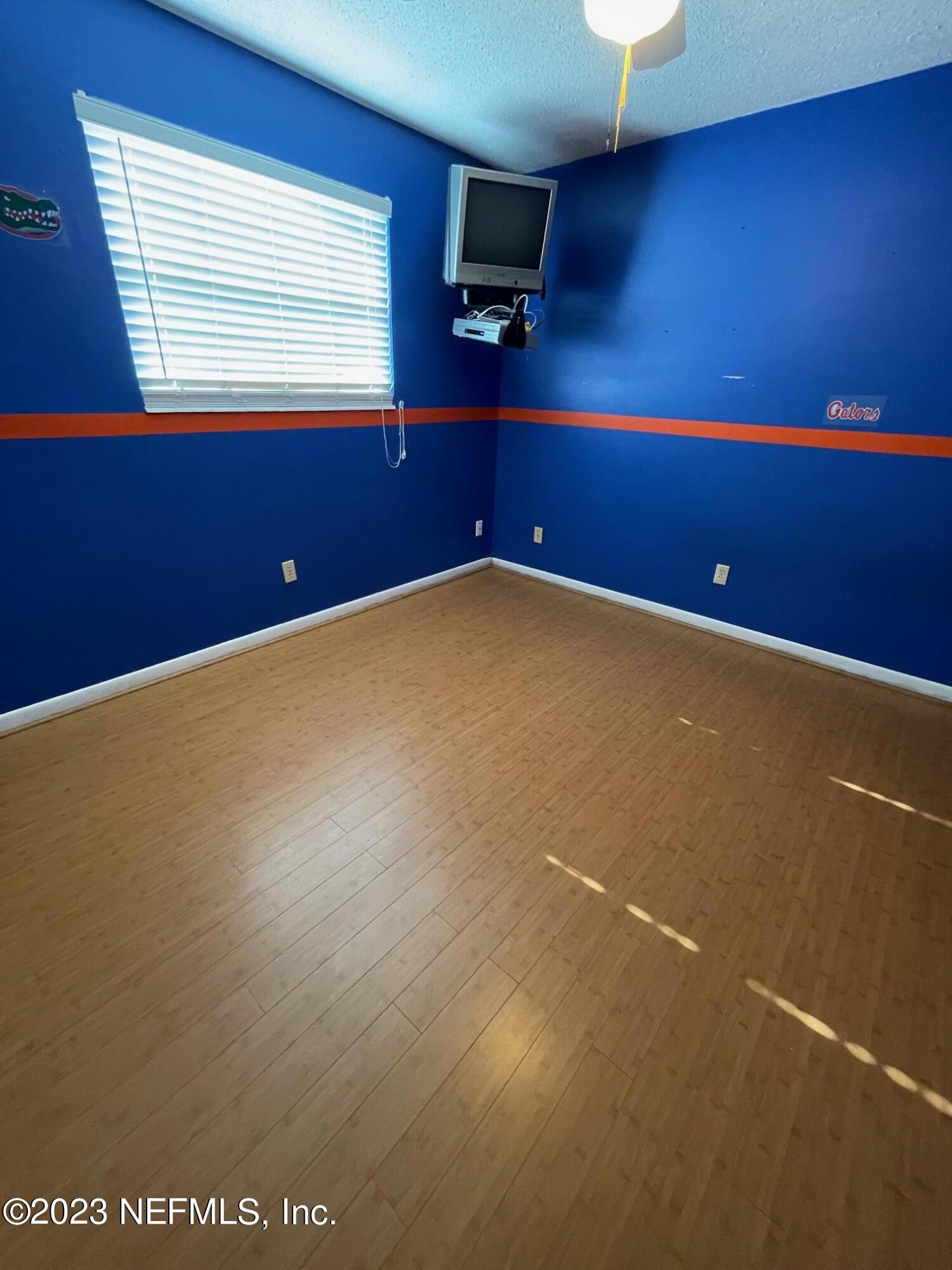 1042 Jamaica Road East Jacksonville, FL 32216 - Photo 26 of 59 a view of an empty room with a window