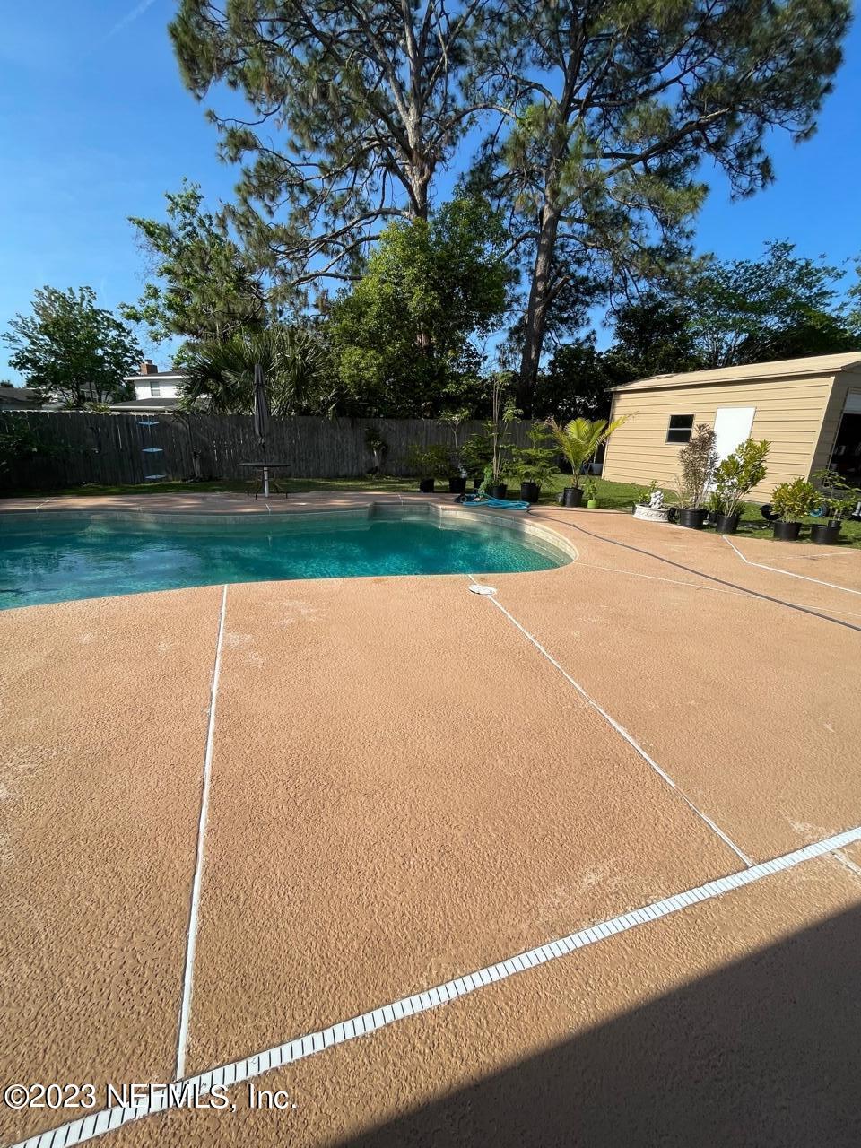 1042 Jamaica Road East Jacksonville, FL 32216 - Photo 50 of 59 a view of a tennis court