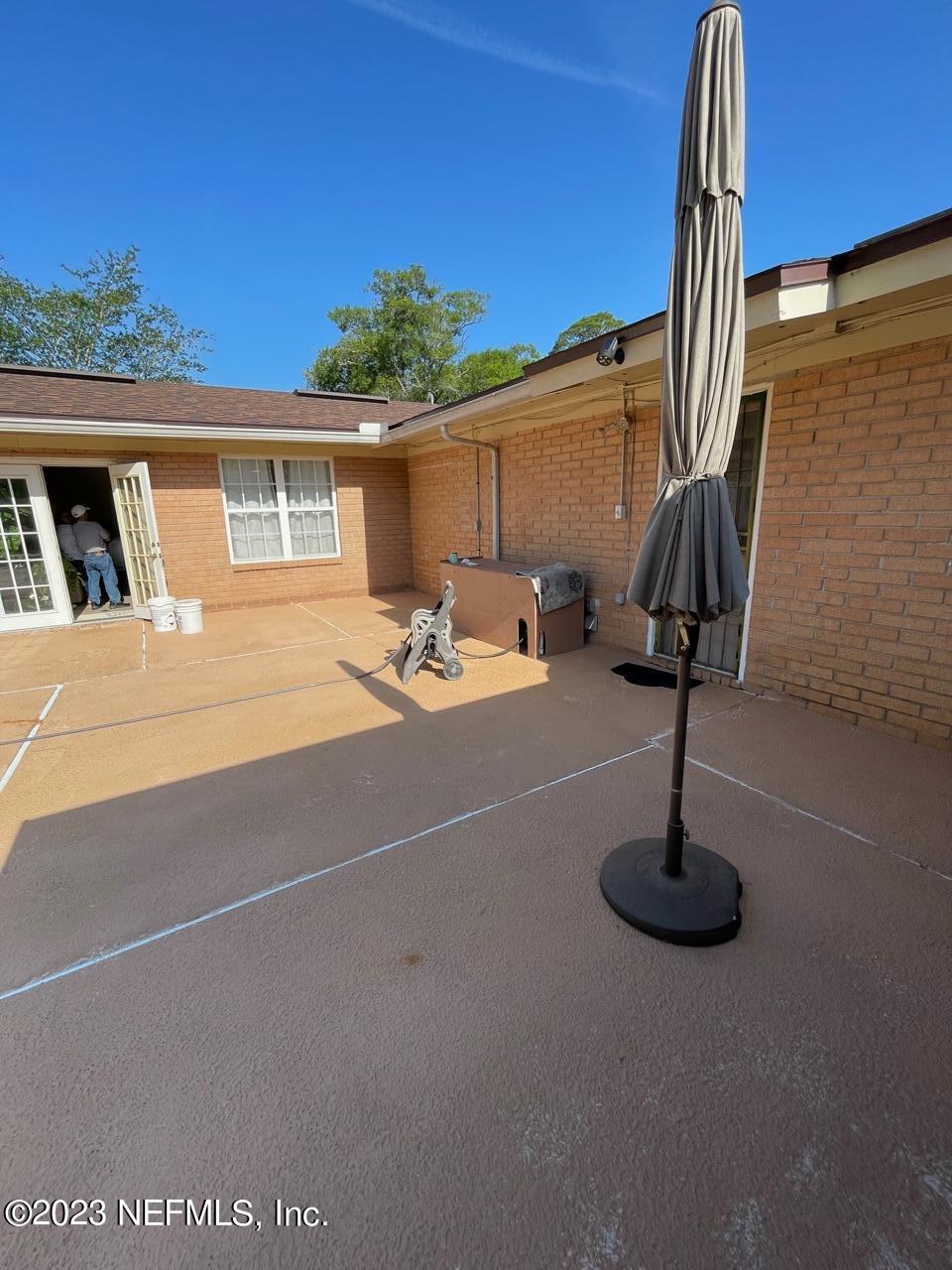1042 Jamaica Road East Jacksonville, FL 32216 - Photo 53 of 59 a house view with a backyard space