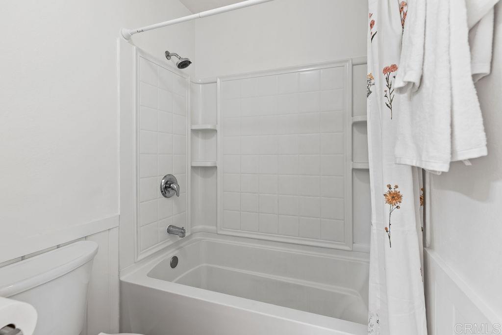 5918 Rancho Mission Road, Unit 62 San Diego, CA 92108 - Photo 22 of 37 a bathroom with a bathtub and a shower