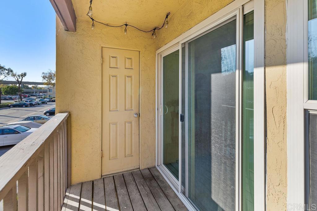 5918 Rancho Mission Road, Unit 62 San Diego, CA 92108 - Photo 24 of 37 a view of a wooden door