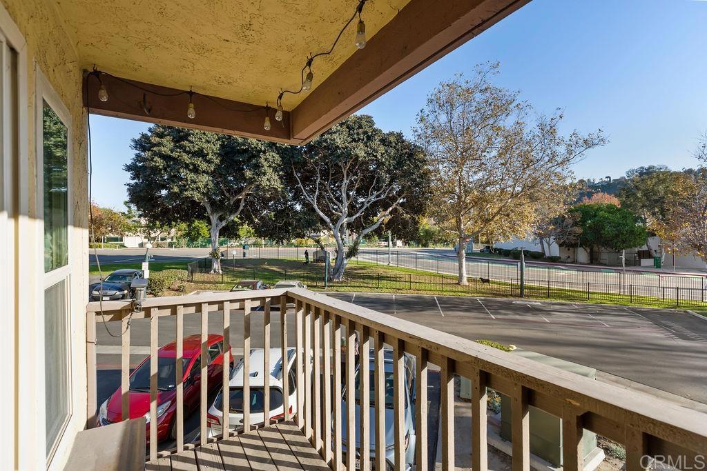 5918 Rancho Mission Road, Unit 62 San Diego, CA 92108 - Photo 25 of 37 a view of a balcony with yard