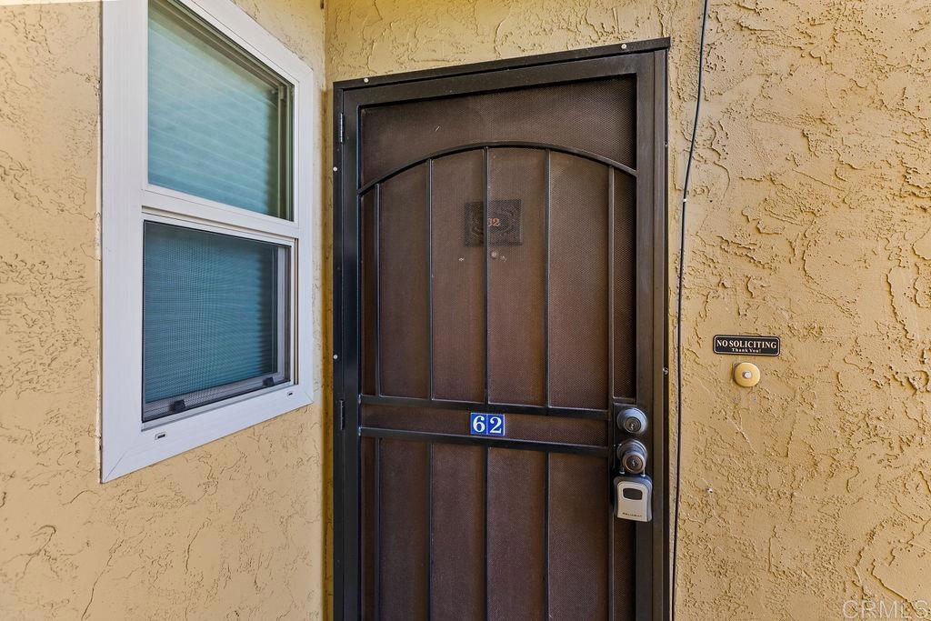5918 Rancho Mission Road, Unit 62 San Diego, CA 92108 - Photo 26 of 37 a view of front door