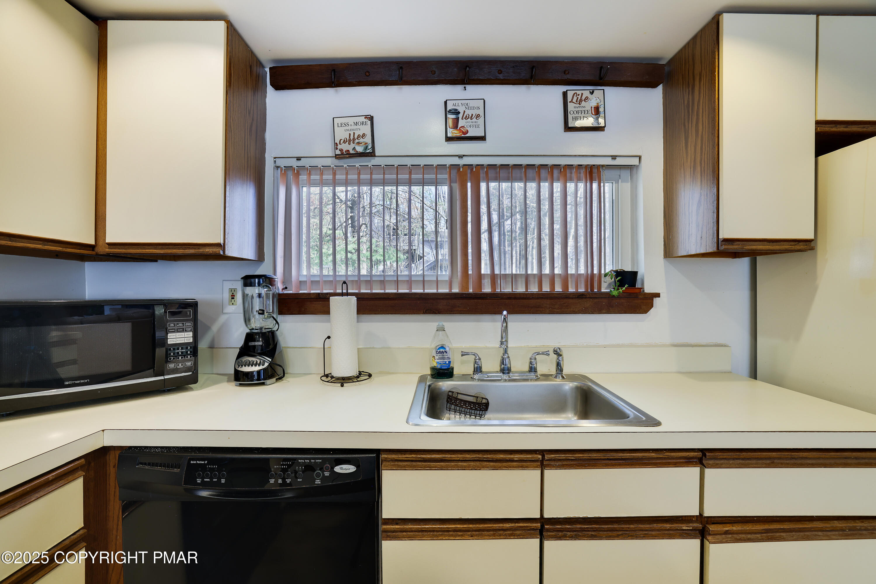 3336 Windemere Drive Bushkill, PA 18324 - Photo 25 of 67 a kitchen with a sink cabinets and a window