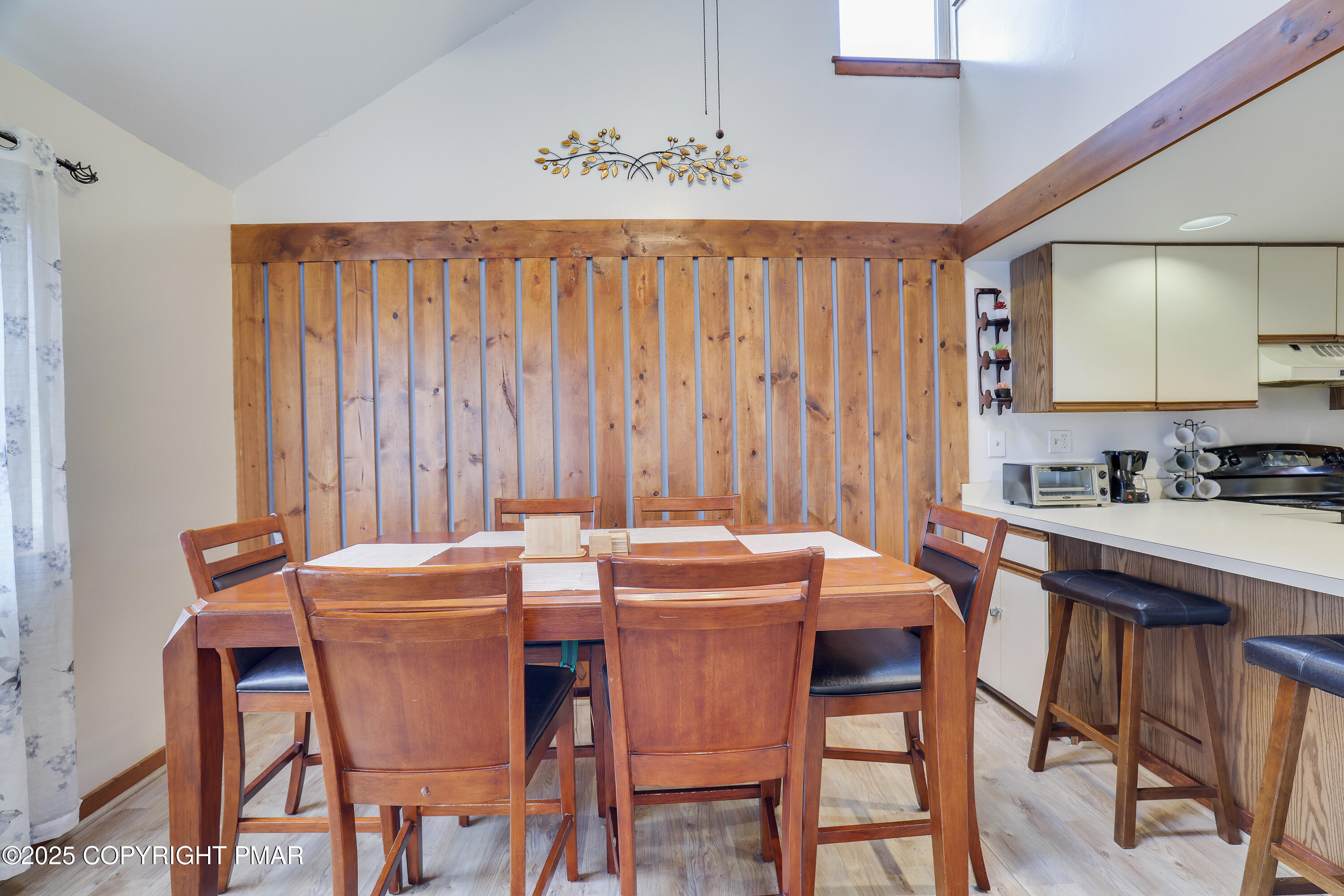 3336 Windemere Drive Bushkill, PA 18324 - Photo 6 of 67 a dining room with a table and chairs