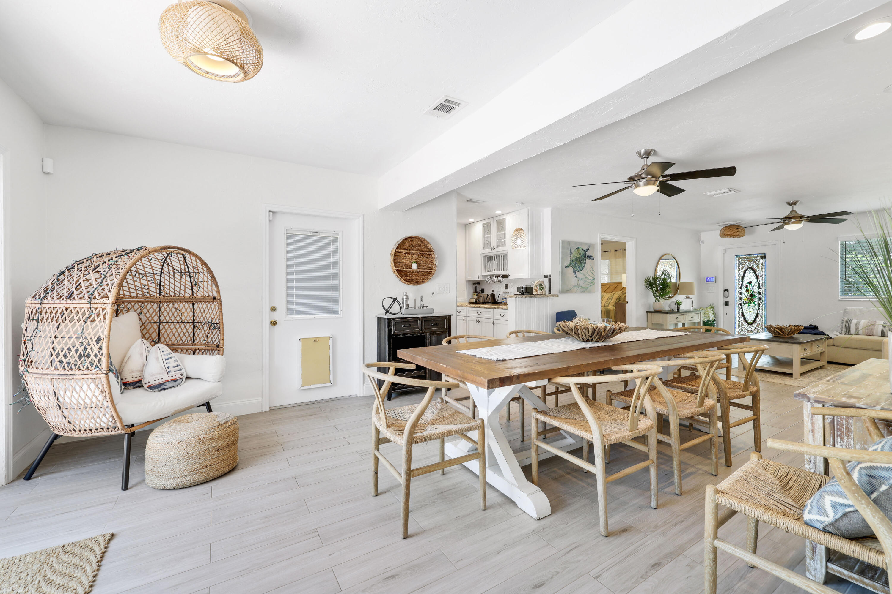 342 Southwest 14th Street Pompano Beach, FL 33060 - Photo 13 of 39 a dining room with furniture and a window