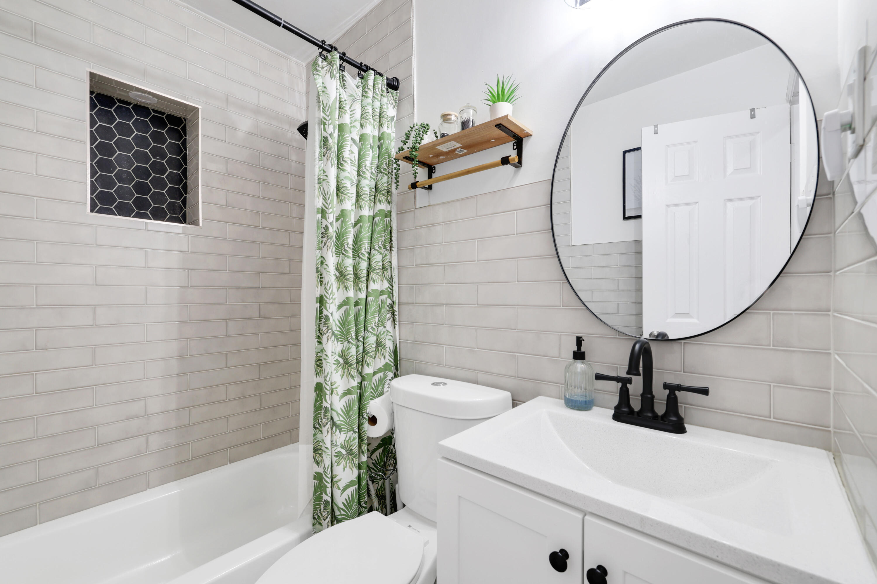 342 Southwest 14th Street Pompano Beach, FL 33060 - Photo 32 of 39 a bathroom with a sink a toilet and shower