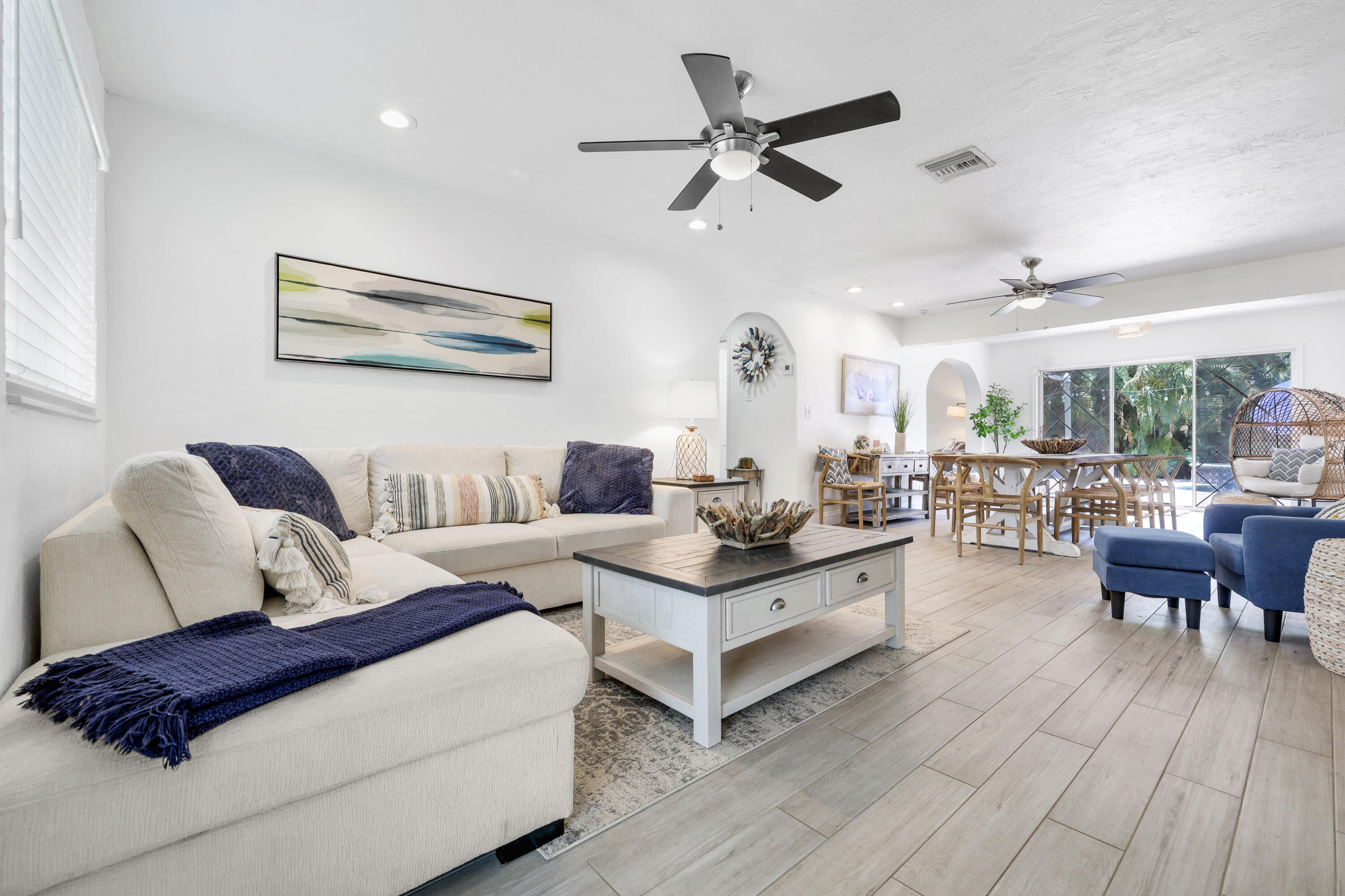 342 Southwest 14th Street Pompano Beach, FL 33060 - Photo 4 of 39 a living room with furniture and a large window