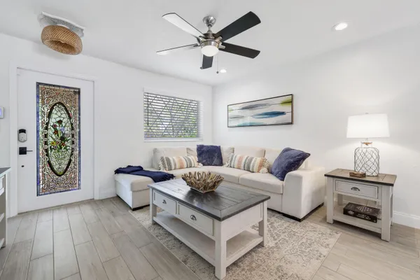 a living room with furniture and a window