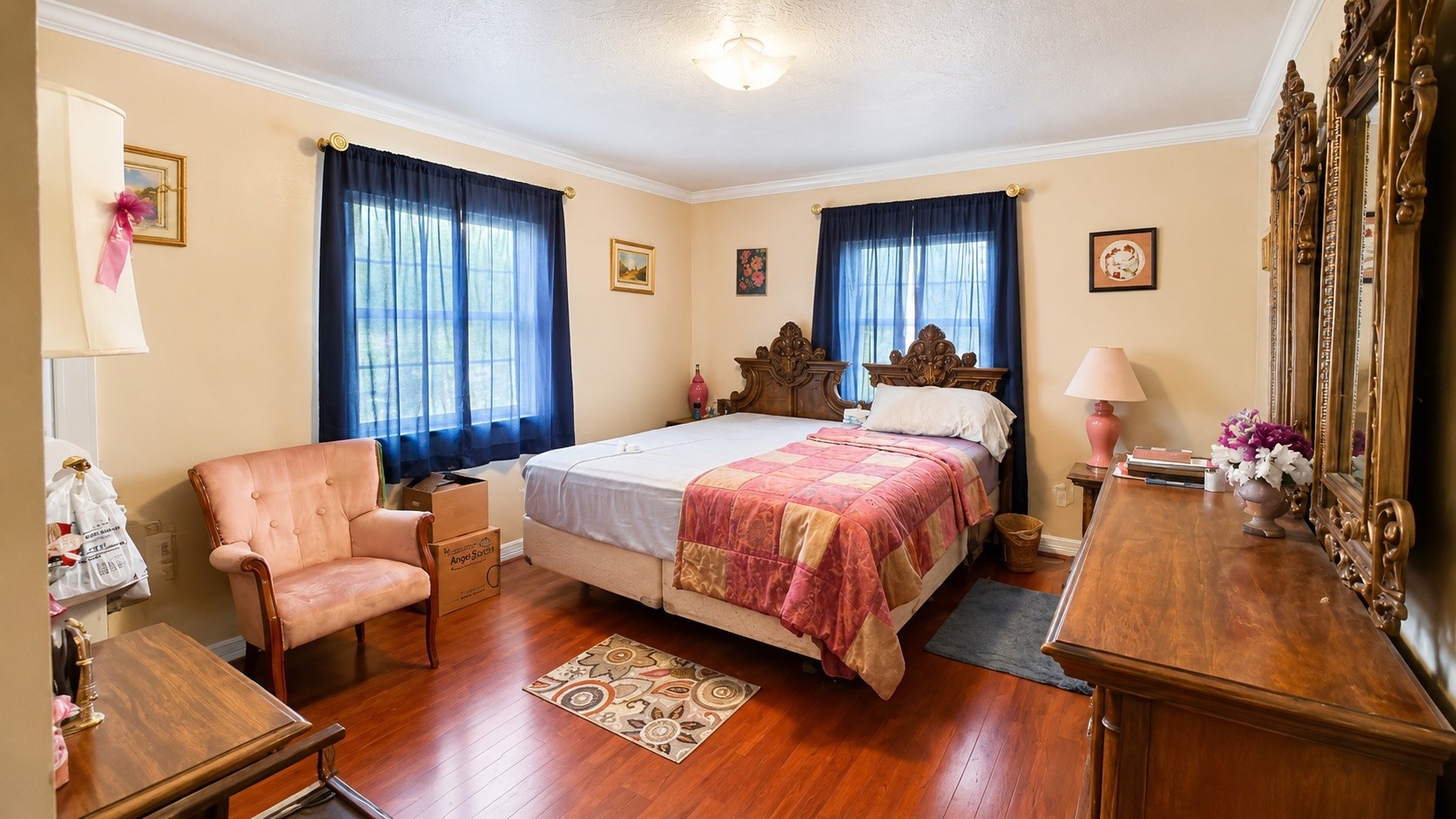 5130 Cortelyou Lane Houston, TX 77021 - Photo 10 of 13 The primary suite offers generous space, hardwood floors, and a comfortable layout designed for everyday relaxation.