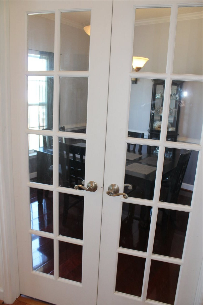 4304 Willow Lake Road Raleigh, NC 27616 - Photo 10 of 28 French doors to the dining room. Could also be study/home office. Dining Room