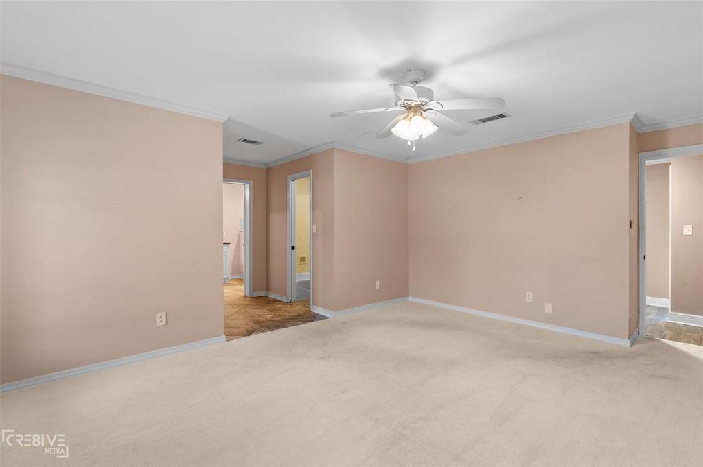 6095 Keithville-Springridge Road Keithville, LA 71047 - Photo 17 of 38 a view of an empty room with a ceiling fan