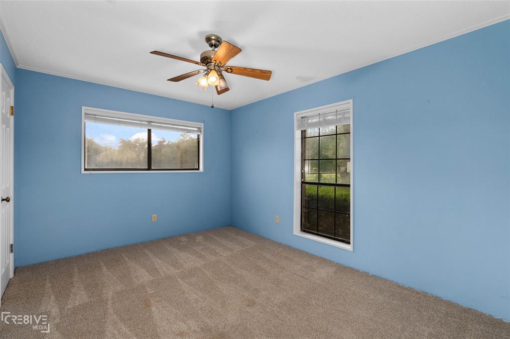6095 Keithville-Springridge Road Keithville, LA 71047 - Photo 22 of 38 a view of an empty room with a window