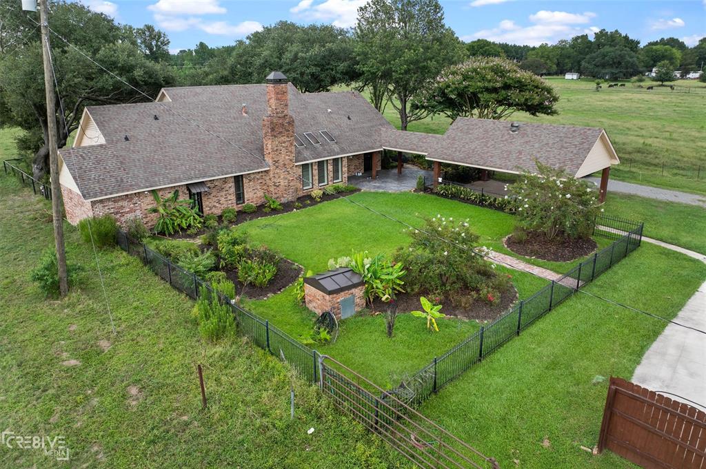 6095 Keithville-Springridge Road Keithville, LA 71047 - Photo 27 of 38 an aerial view of a house with garden space and street view