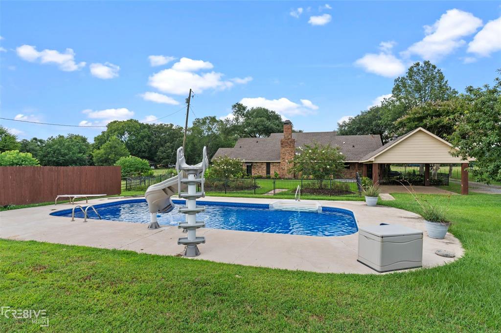 6095 Keithville-Springridge Road Keithville, LA 71047 - Photo 30 of 38 a view of a backyard with swimming pool