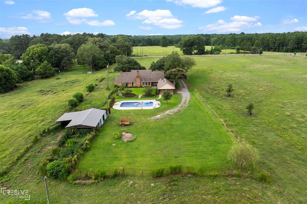 6095 Keithville-Springridge Road Keithville, LA 71047 - Photo 33 of 38 a view of a lake with a yard
