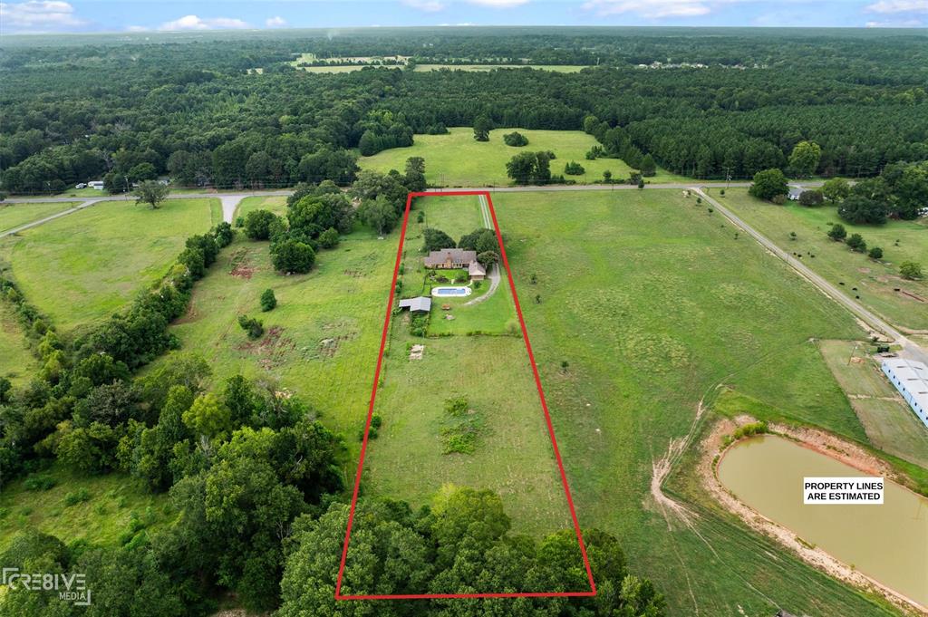 6095 Keithville-Springridge Road Keithville, LA 71047 - Photo 34 of 38 an aerial view of a residential houses with outdoor space and trees