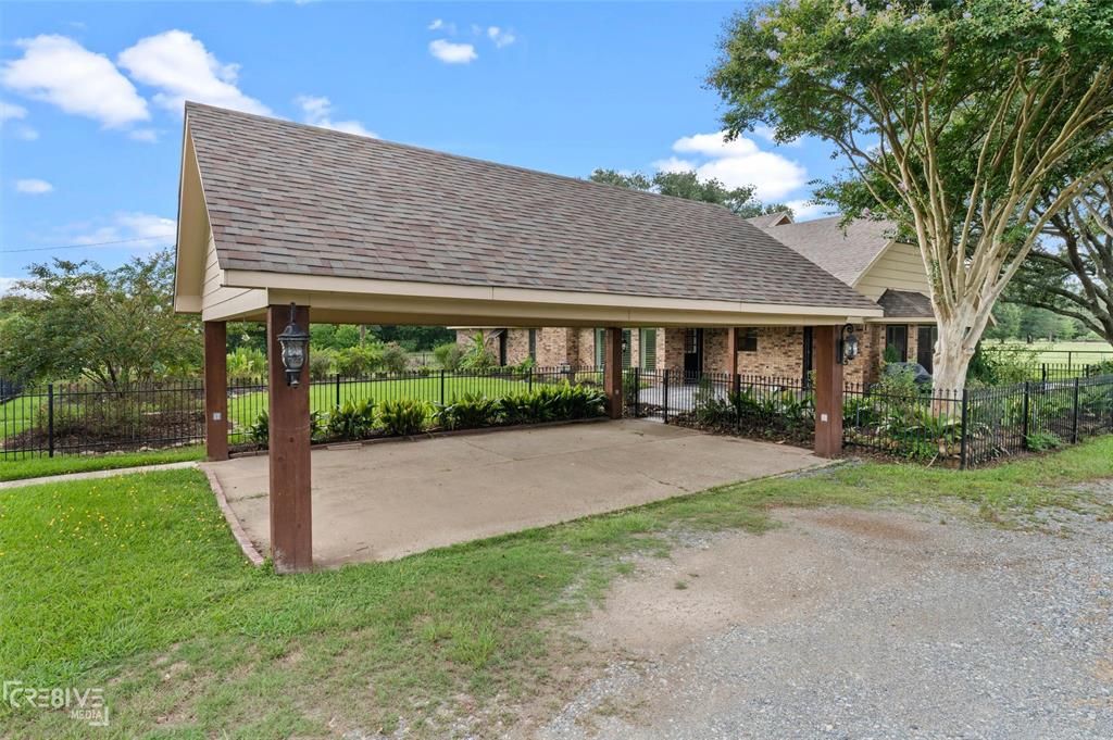 6095 Keithville-Springridge Road Keithville, LA 71047 - Photo 37 of 38 a house view with a garden space