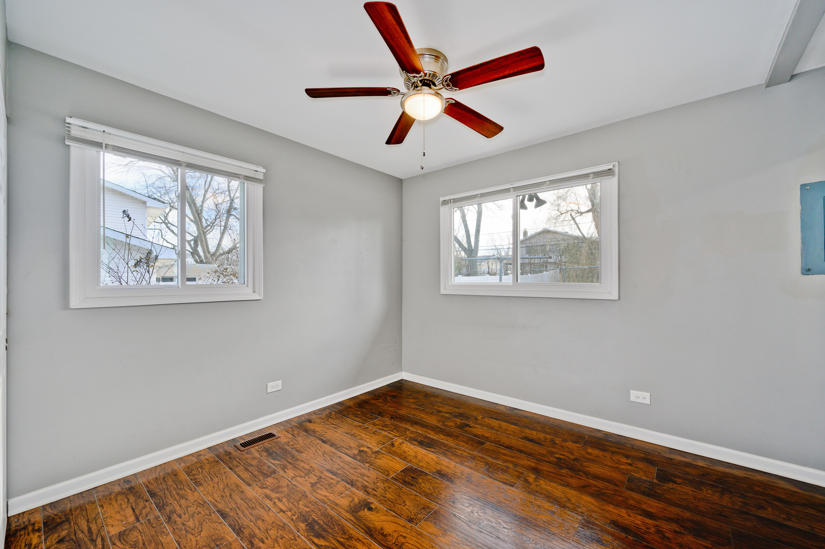 555 Jamison Lane Hoffman Estates, IL 60169 - Photo 9 of 16 a view of empty room with wooden floor