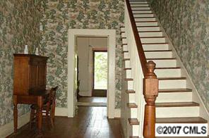 1141 West End Road Chester, SC 29706 - Photo 3 of 8 a view of an entryway with wooden floor and door
