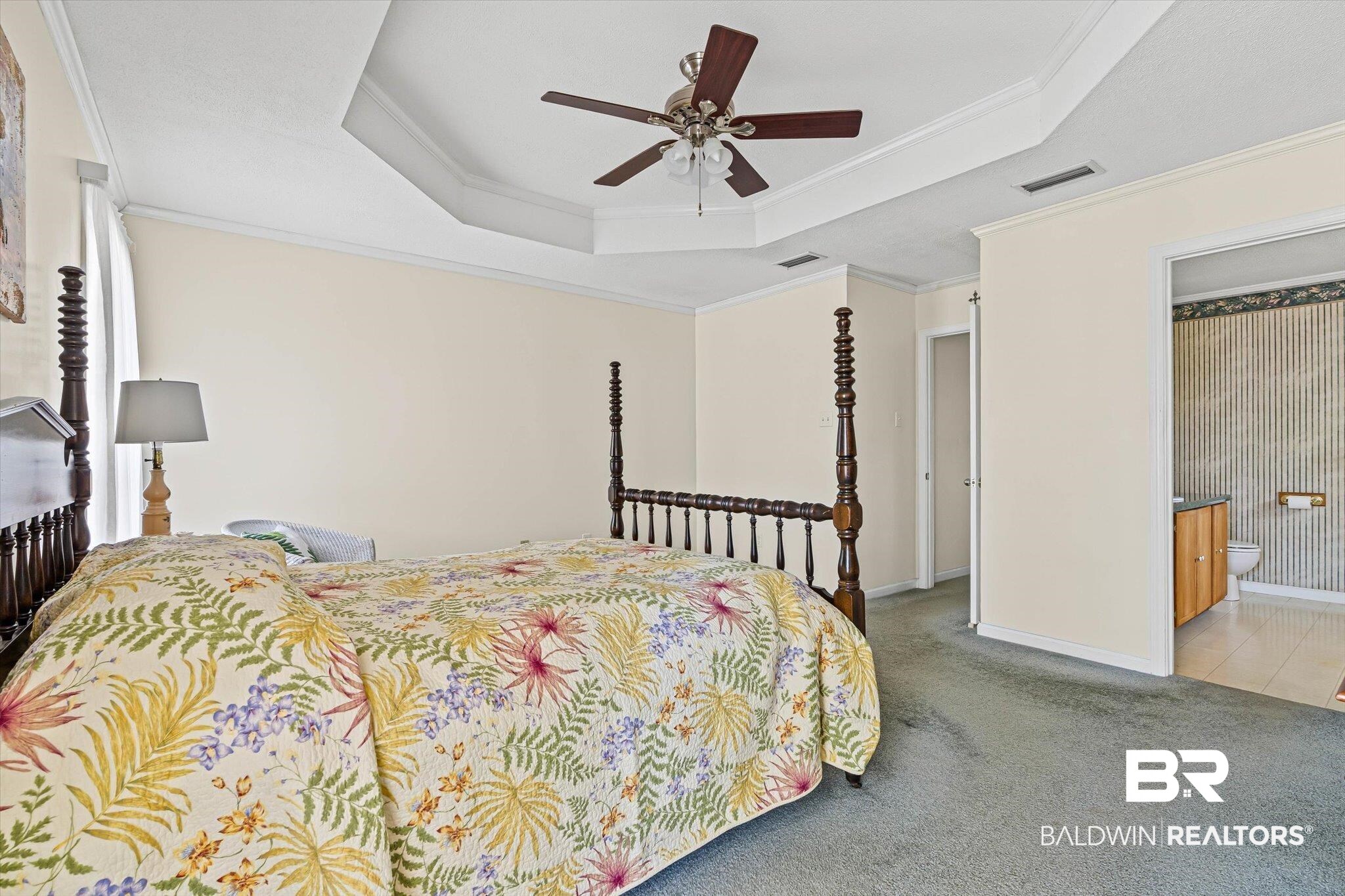 431 Simms Drive Saraland, AL 36571 - Photo 12 of 34 Bedroom featuring a tray ceiling, light colored carpet, ornamental molding, and ceiling fan