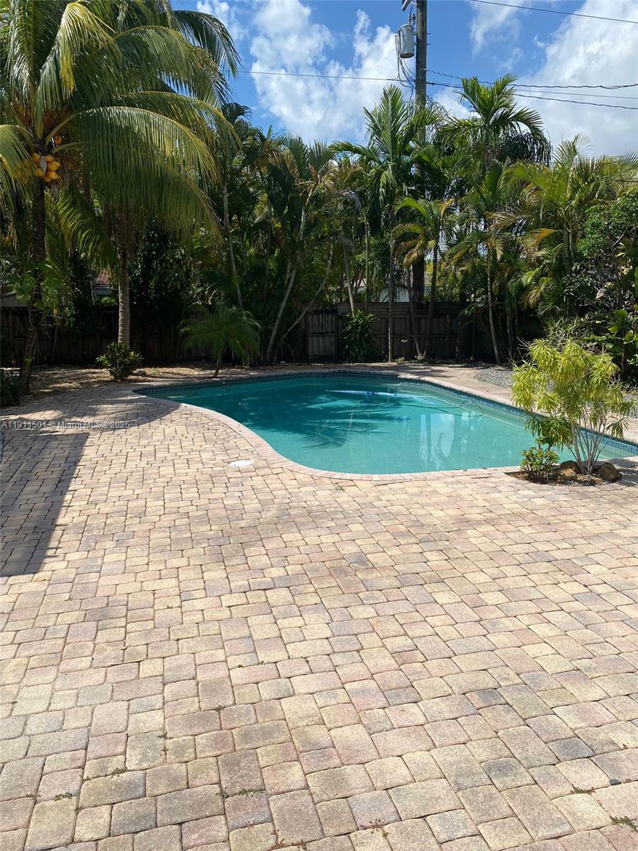 1516 Funston Street Hollywood, FL 33020 - Photo 3 of 23 a view of backyard with green space