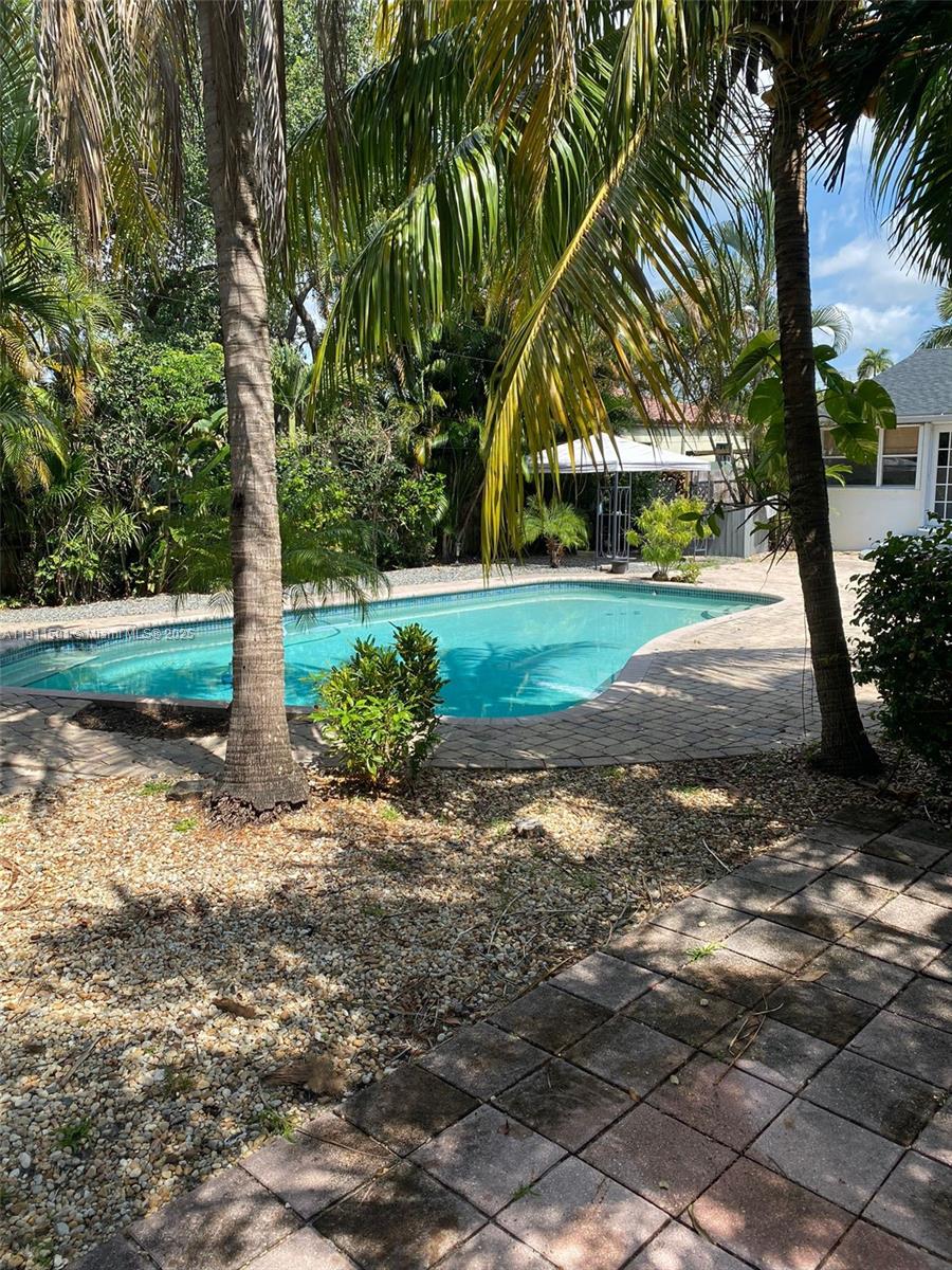 1516 Funston Street Hollywood, FL 33020 - Photo 7 of 23 a view of backyard with green space