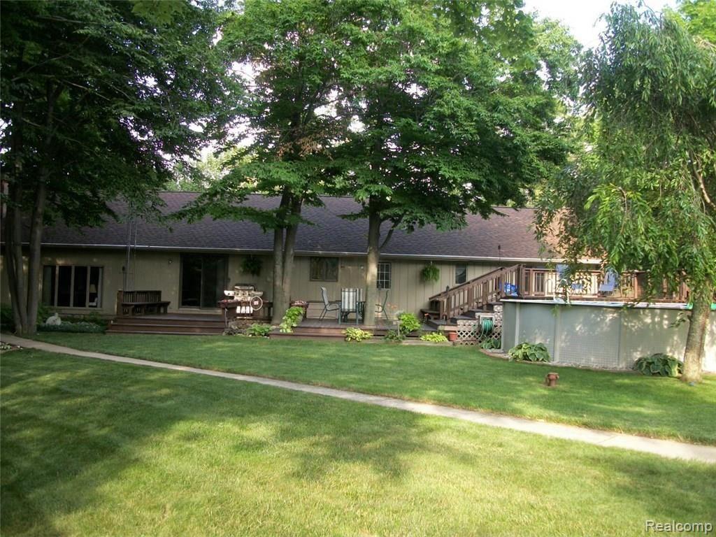 3810 South Sandusky Road Peck, MI 48466 - Photo 10 of 26 This is a view of the back of the home.