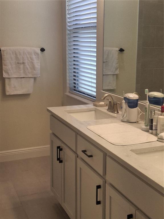 12618 Vander Way New Port Richey, FL 34654 - Photo 2 of 22 a bathroom with a sink and a toilet