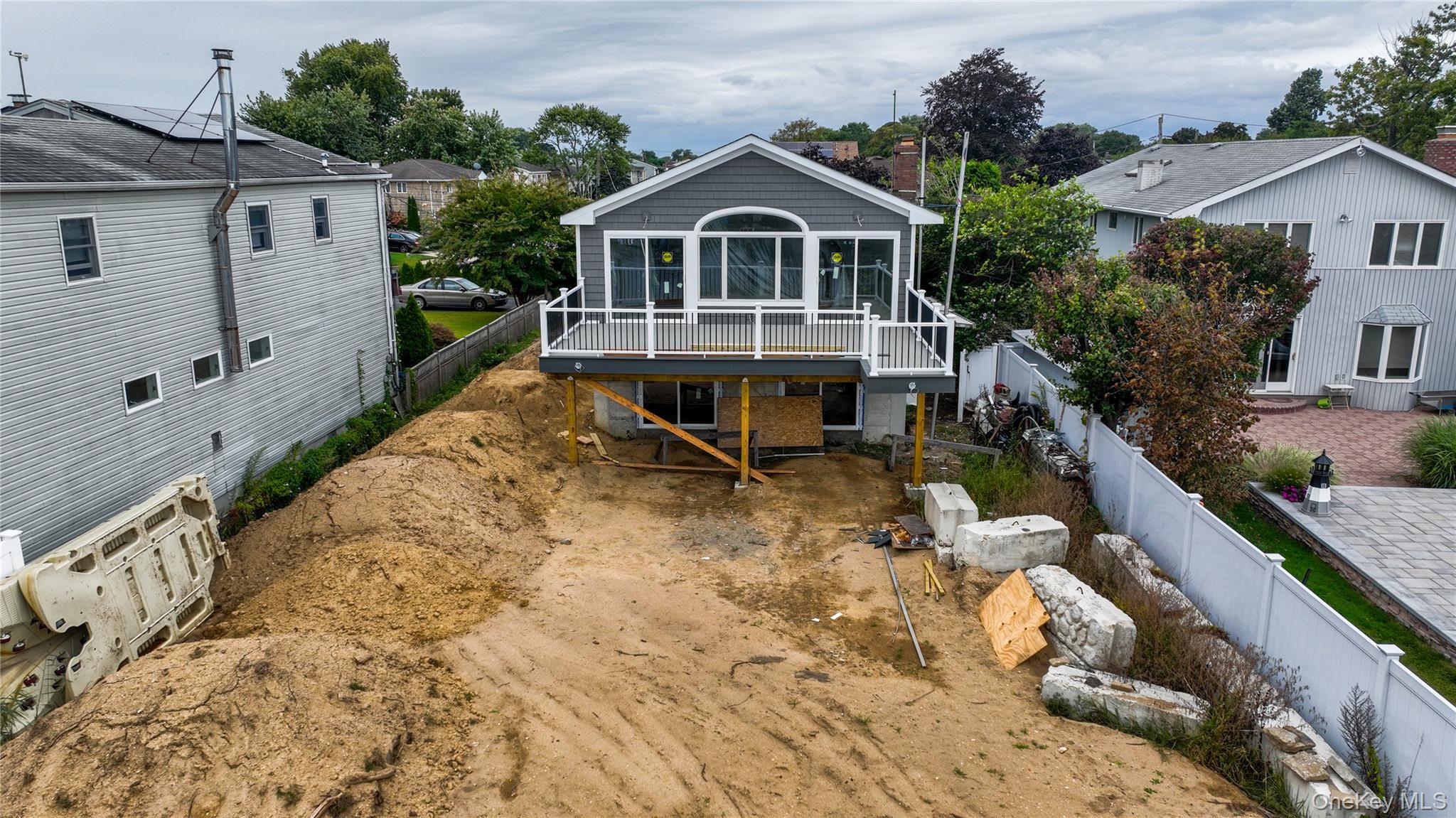 750 Shore Walk Lindenhurst, NY 11757 - Photo 17 of 21 a view of a house with a yard