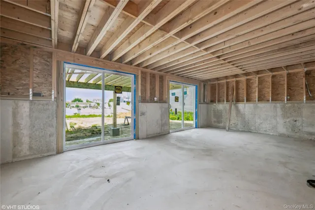 a view of an empty room with a sliding door