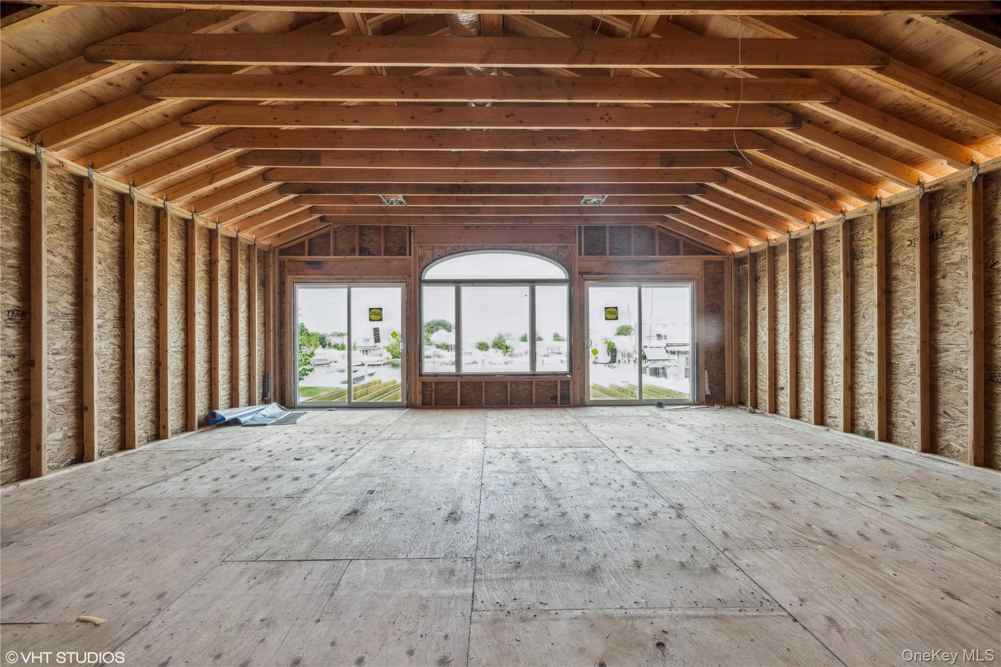 750 Shore Walk Lindenhurst, NY 11757 - Photo 10 of 21 a view of large room with windows