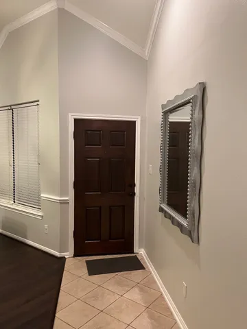a bathroom with a sink double vanity and a mirror