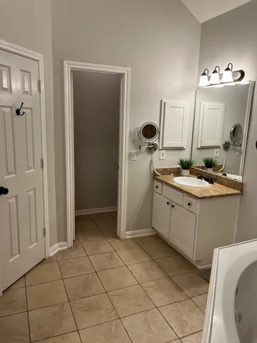 a view of a bedroom from a hallway