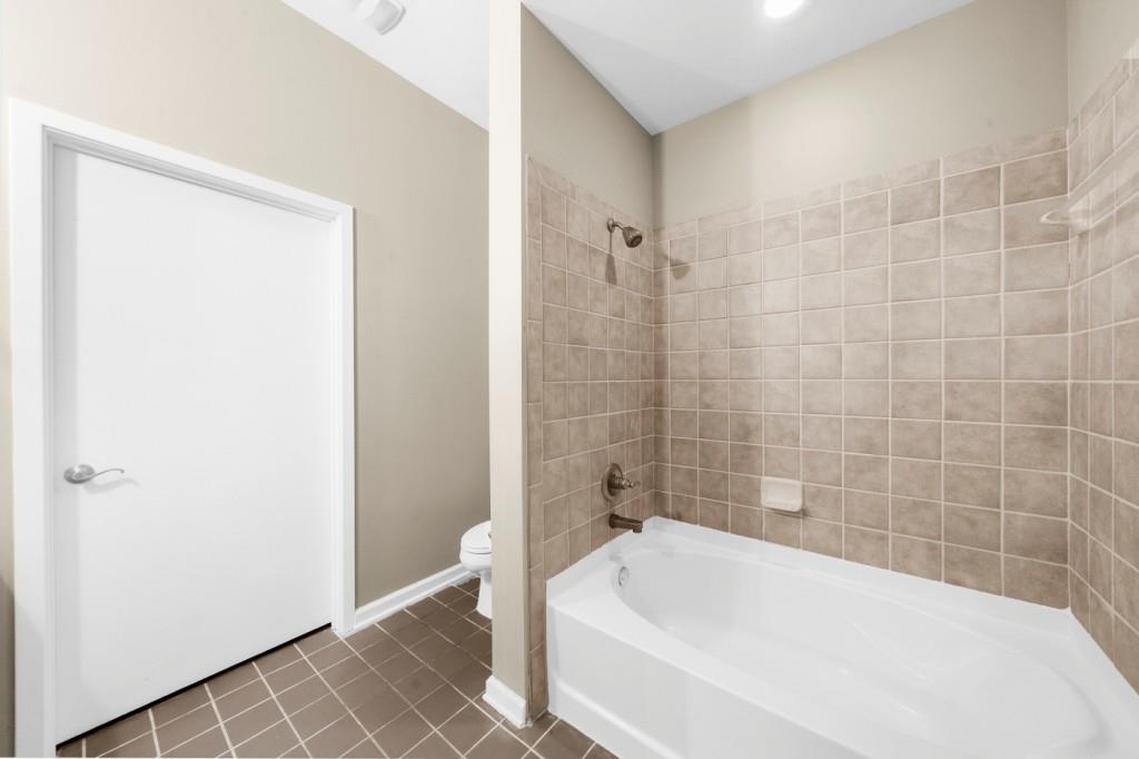 5300 Peachtree Road, Unit 1608 Chamblee, GA 30341 - Photo 27 of 47 a bathroom with a white bathtub