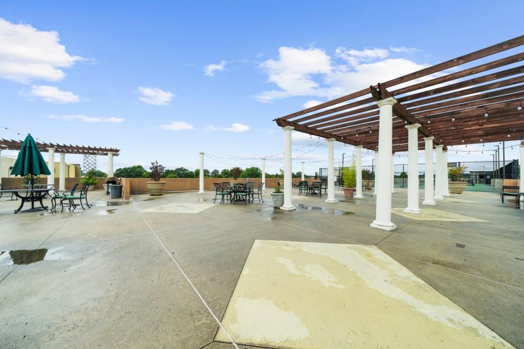 5300 Peachtree Road, Unit 1608 Chamblee, GA 30341 - Photo 36 of 47 a view of a swimming pool with outdoor seating