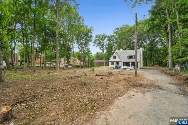 a view of a park with swings and slides