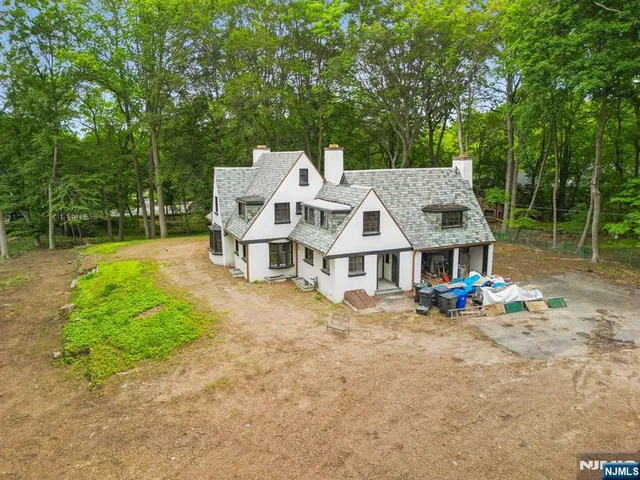 an outdoor space with furniture and garden view