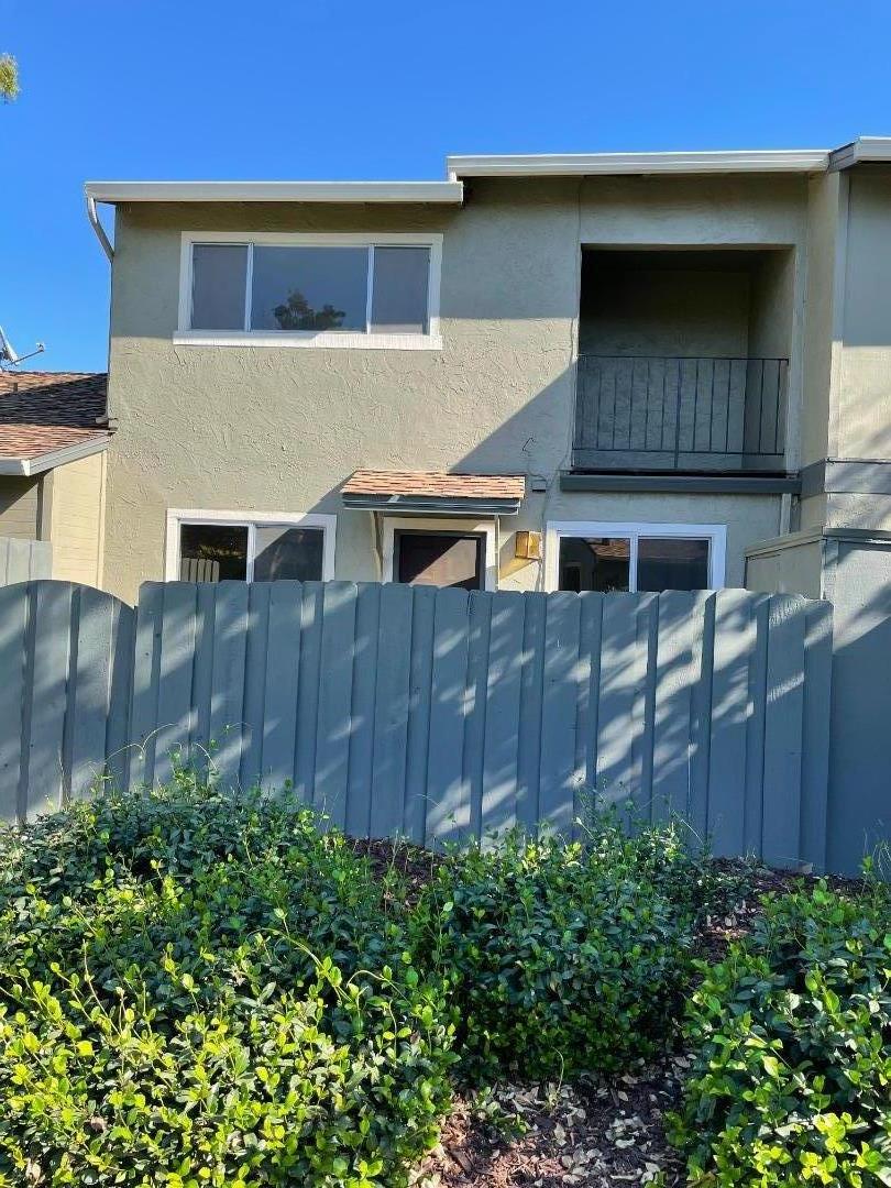 4685 Persimmon Place San Jose, CA 95129 - Photo 1 of 17 a front view of a house with garden