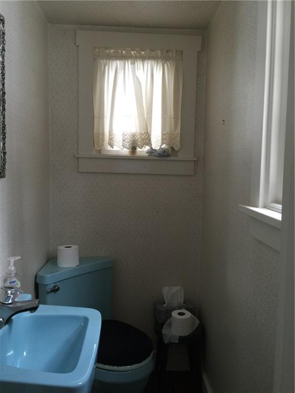 513 Walnut Road Pittsburgh, PA 15202 - Photo 10 of 19 Half bath found right as you enter the home in the entry. Amazing use of every nook and cranny!