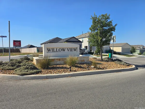 a sign board on the side of a road