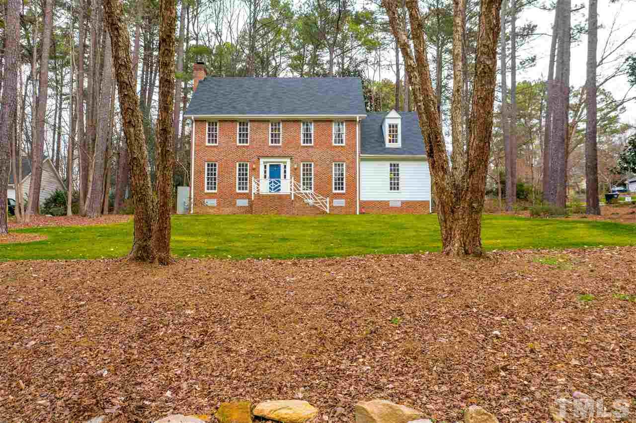 8101 Calais Court Raleigh, NC 27613 - Photo 1 of 24 a view of a house with a yard